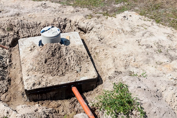 signs that your septic tank needs pumping include slow draining toilets and foul odors, indicating it is time for septic tank pumping